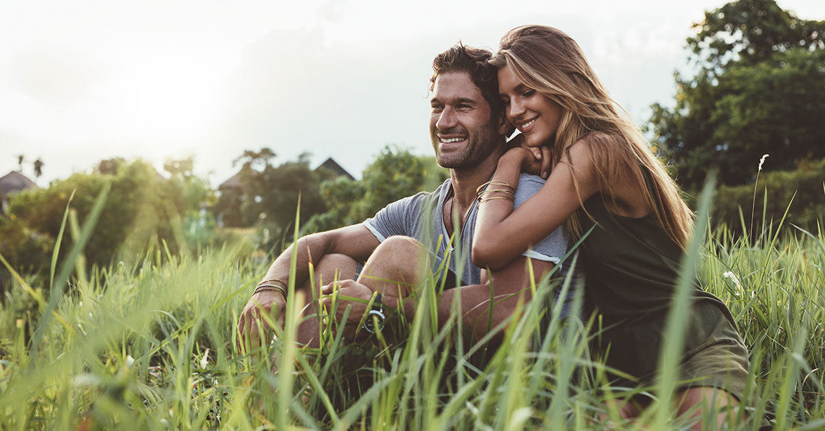 Boyfriend and Girlfriend Outdoors Smiling
